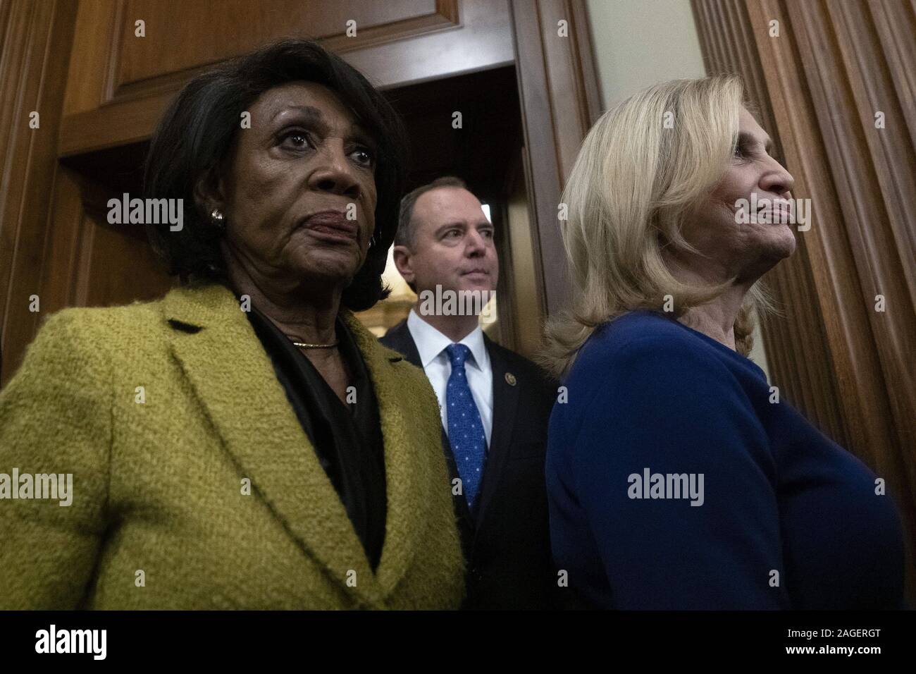 Washington, District of Columbia, USA. 18th Dec, 2019. From left to right: United States Representative Maxine Waters (Democrat of California), United States Representative Adam Schiff (Democrat of California), and United States Representative Carolyn Maloney (Democrat of New York), United States enter a press conference after the United States House of Representatives voted to impeach United States President Donald J. Trump at the United States Capitol in Washington, DC, U.S., on Wednesday, December 18, 2019. Credit: ZUMA Press, Inc./Alamy Live News Stock Photo