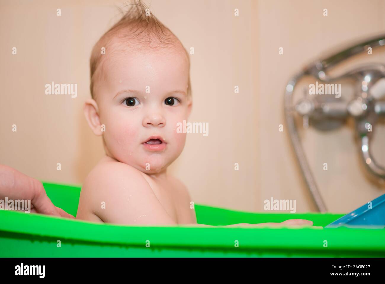 little kid with his mom to clean Stock Photo Alamy