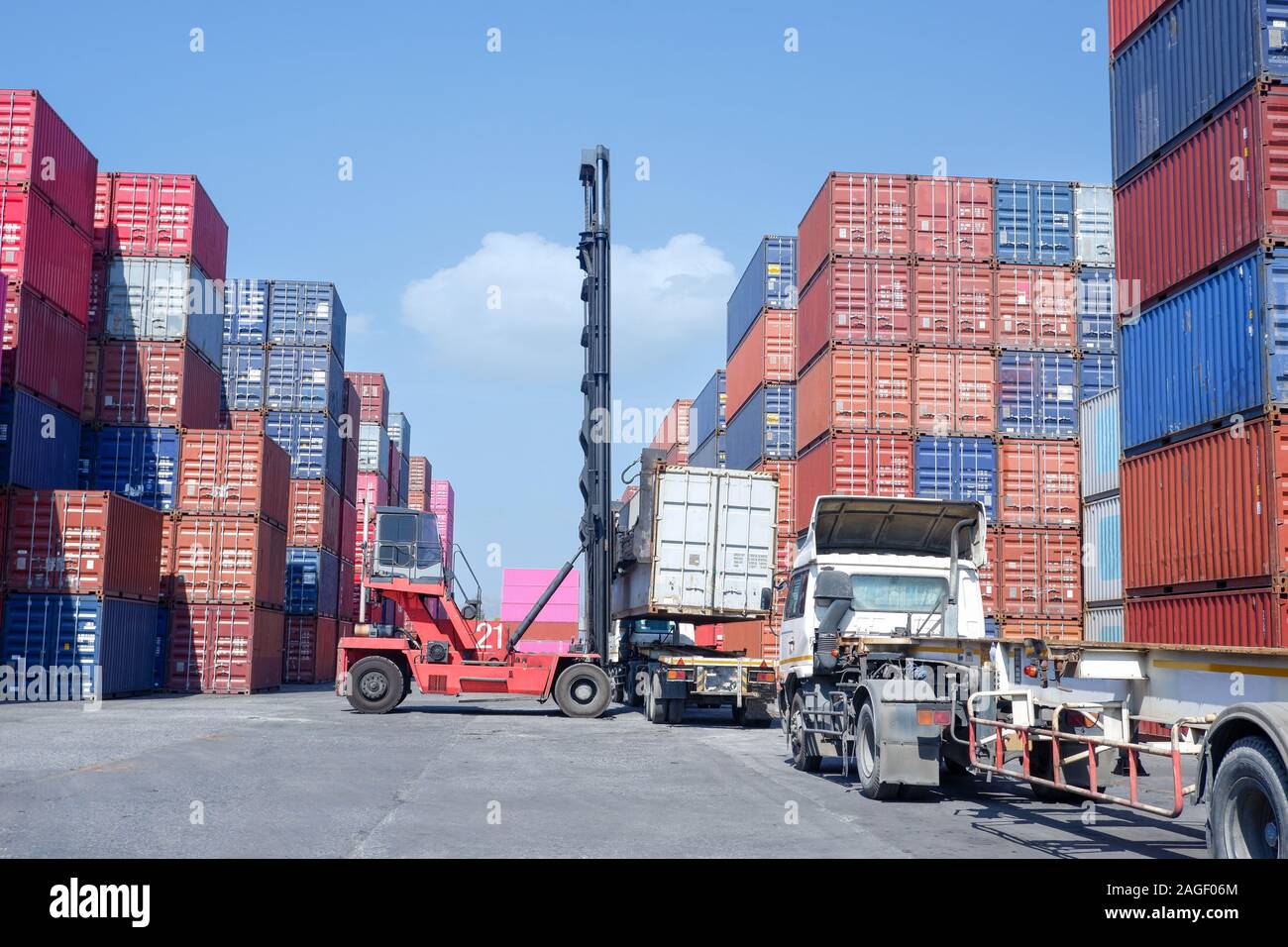 Logistics And Transportation Of Harbor Container Truck Container Forklift The Concept Of Export And Import In Transportation International Trade Stock Photo Alamy