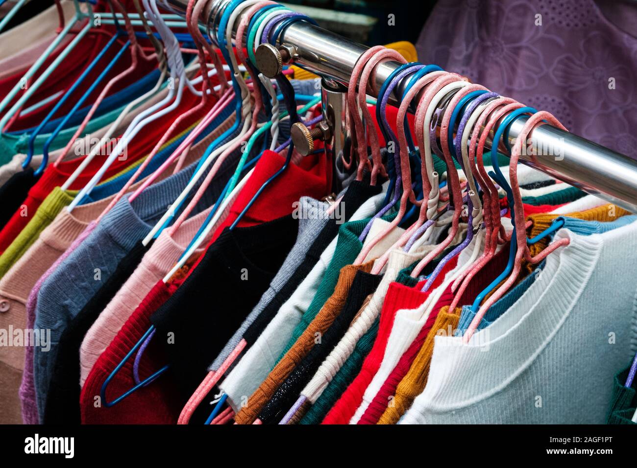 t-shirts and sweaters closeup, second hand clothing Stock Photo