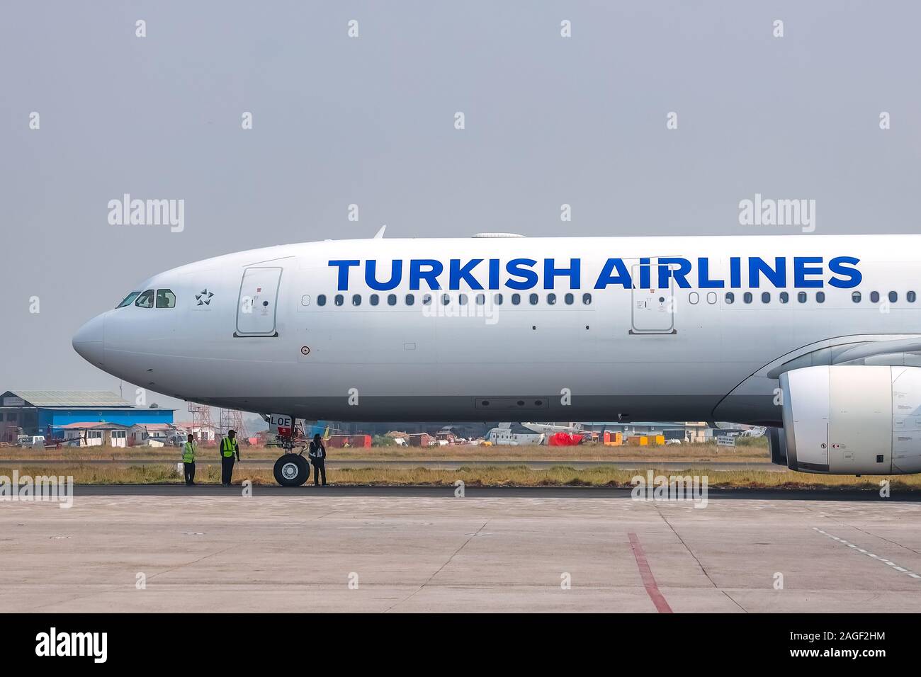 Kathmandu, Nepal - November 22 2019: A Turkish Airlines Boeing 777ER waiting for clearance on taxiway at Tribhuvan International Airport in Kathmandu. Stock Photo
