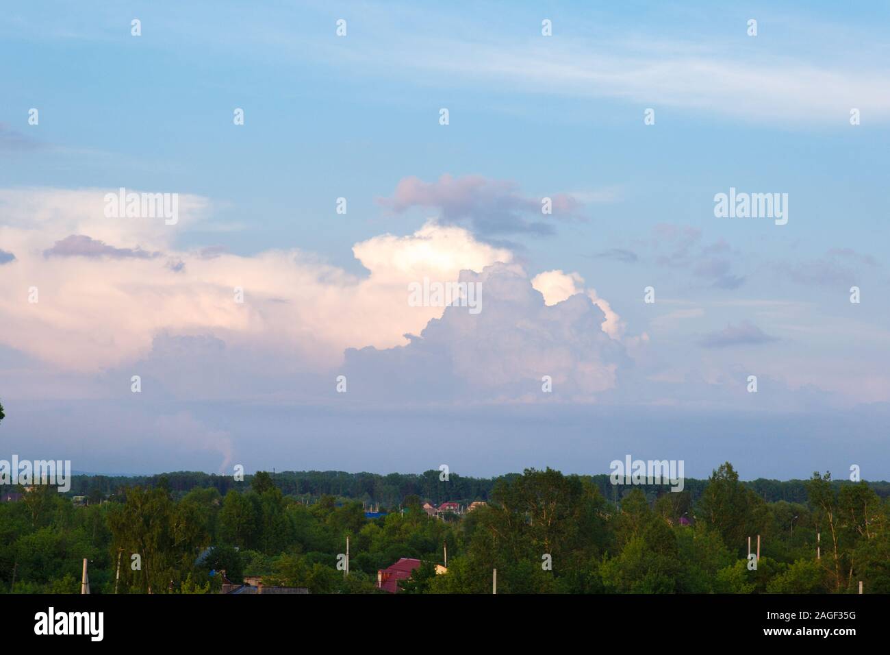 White and thick clouds in a blue sky. Cloudy sky Stock Photo - Alamy