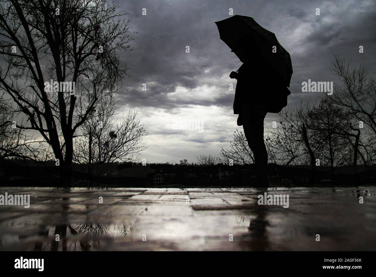 Woman alone rainy day hi-res stock photography and images - Alamy