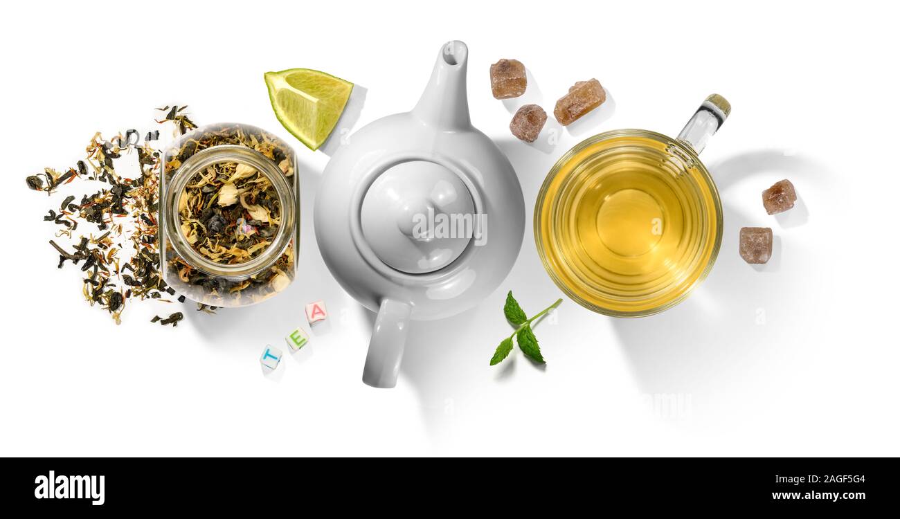 Green tea with aromatic additives and accessories. Top view on white ...
