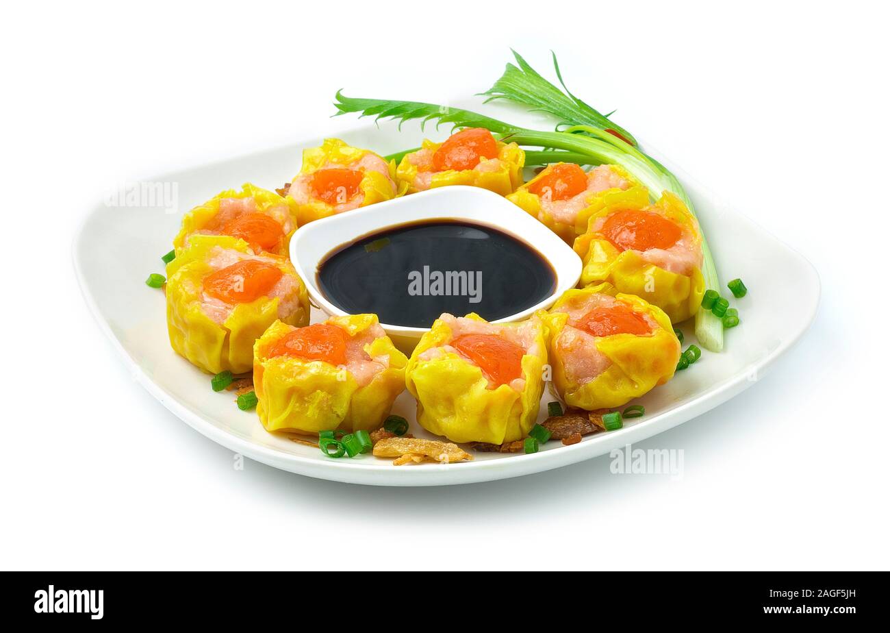 Steamed Shrimps topped Salt Egg Yolks Dumbling Chinese, Asian Food fusion style decorate carved Springs onion,Crispy Garlic, Breakfast dairy time Dumb Stock Photo