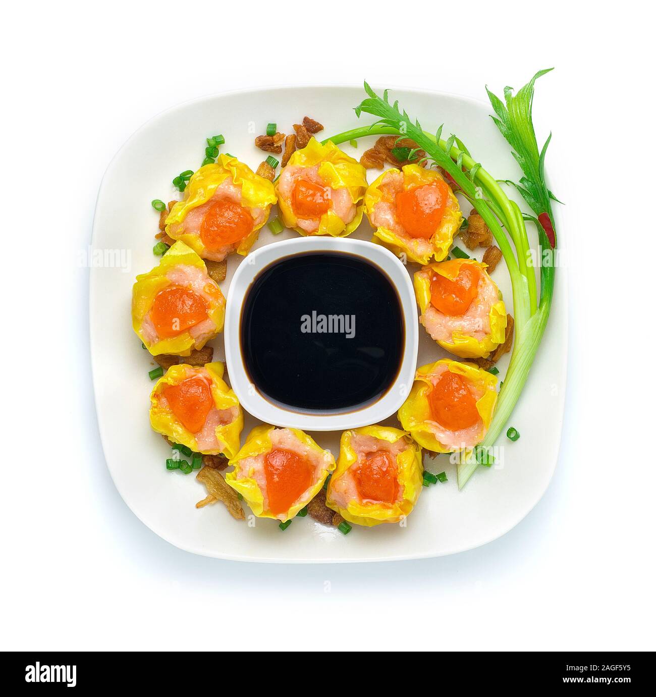 Steamed Shrimps topped Salt Egg Yolks Dumbling Chinese, Asian Food fusion style decorate carved Springs onion,Crispy Garlic, Breakfast dairy time Dumb Stock Photo