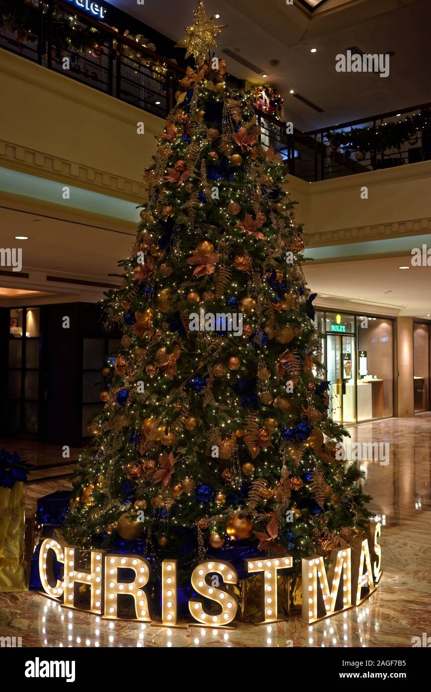 Tree, and the word 'Christmas' in case you did not know what the tree was, Hilton Hotel, Singapore Stock Photo