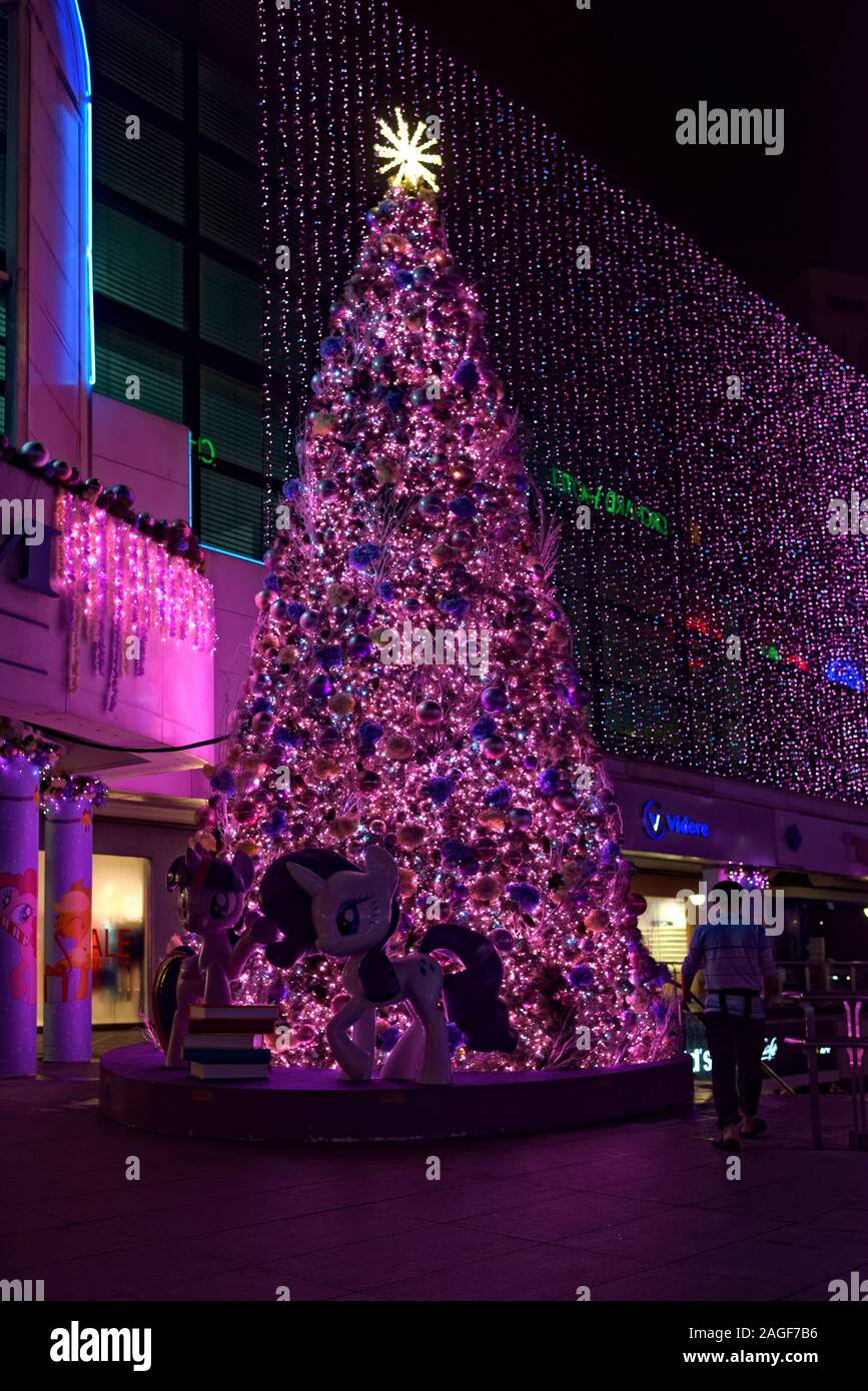 Photo of purple and pink christmas ornaments