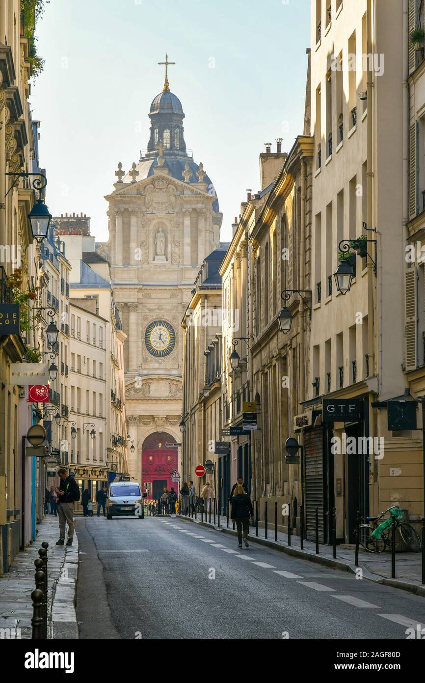 Street view of Rue de Sévigné with the Église Saint-Paul-Saint-Louis church (17th century) in the historic district of the Marais, Paris, France Stock Photo