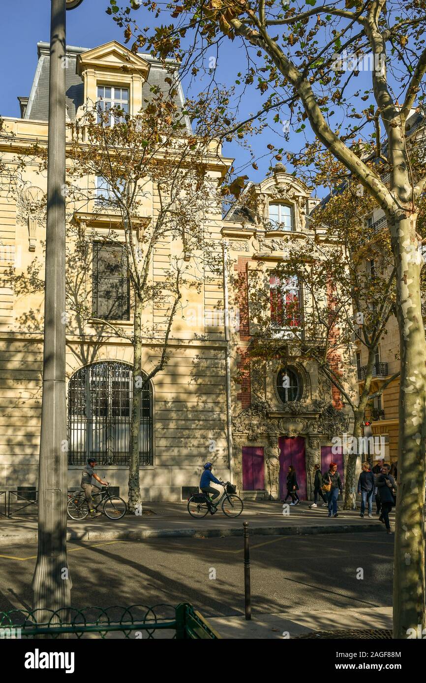 Street view of Quai des Celestins with the Hotel Fieubet, now seat of the Ecole Massillon, in the Marais historic district in autumn, Paris, France Stock Photo