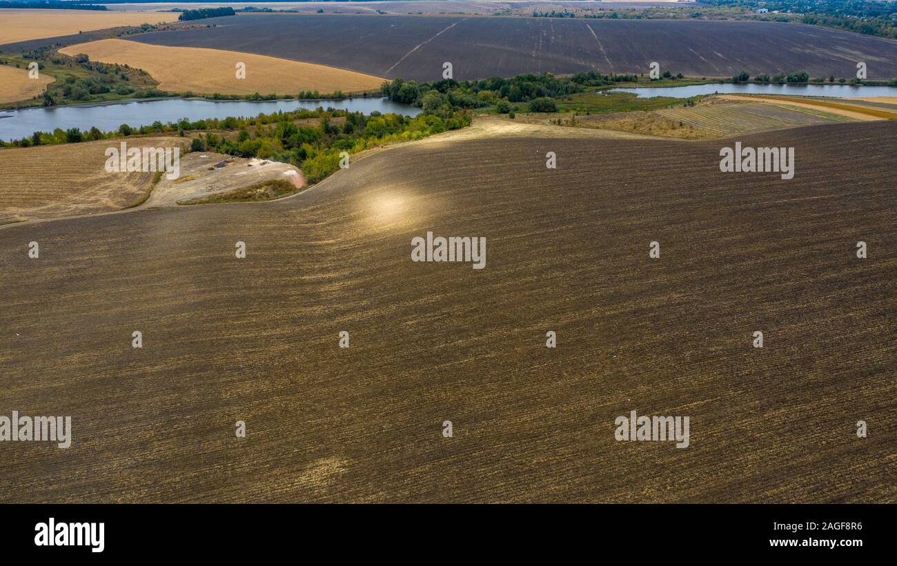 Drone view. Empty agricultural fields with the harvest Stock Photo - Alamy