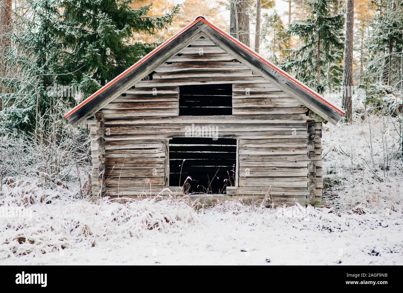 Snow covered hut in a snowy forest hi-res stock photography and images ...