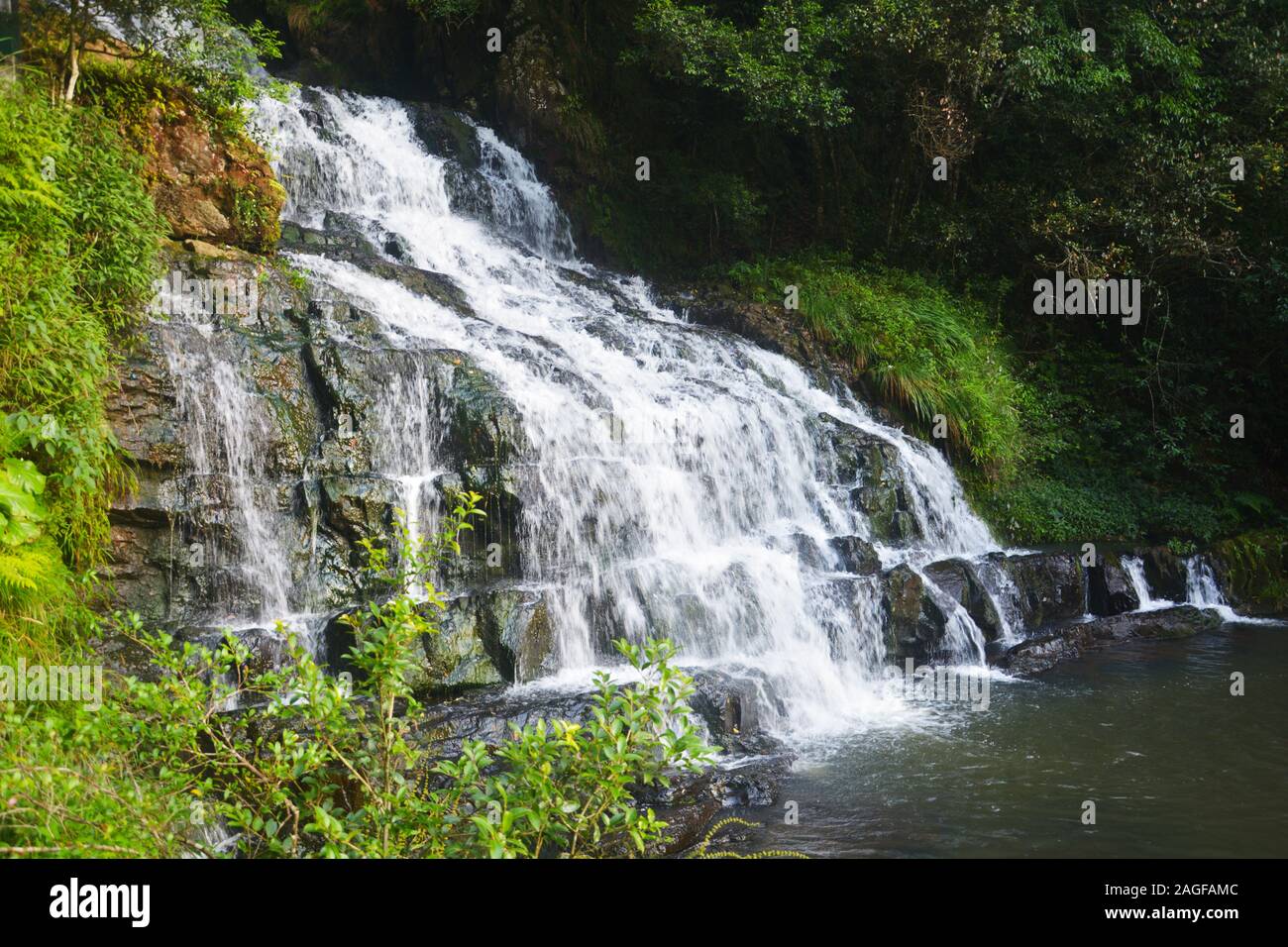 Close up of a stream, water fall in the hills of Shillong, Elephant Falls, Selective focusing Stock Photo