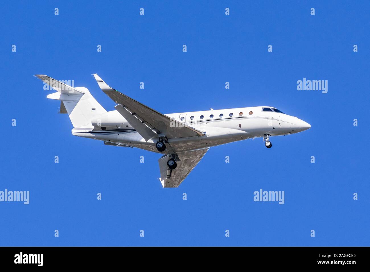 Private airplane preparing to land at an airport in California Stock Photo
