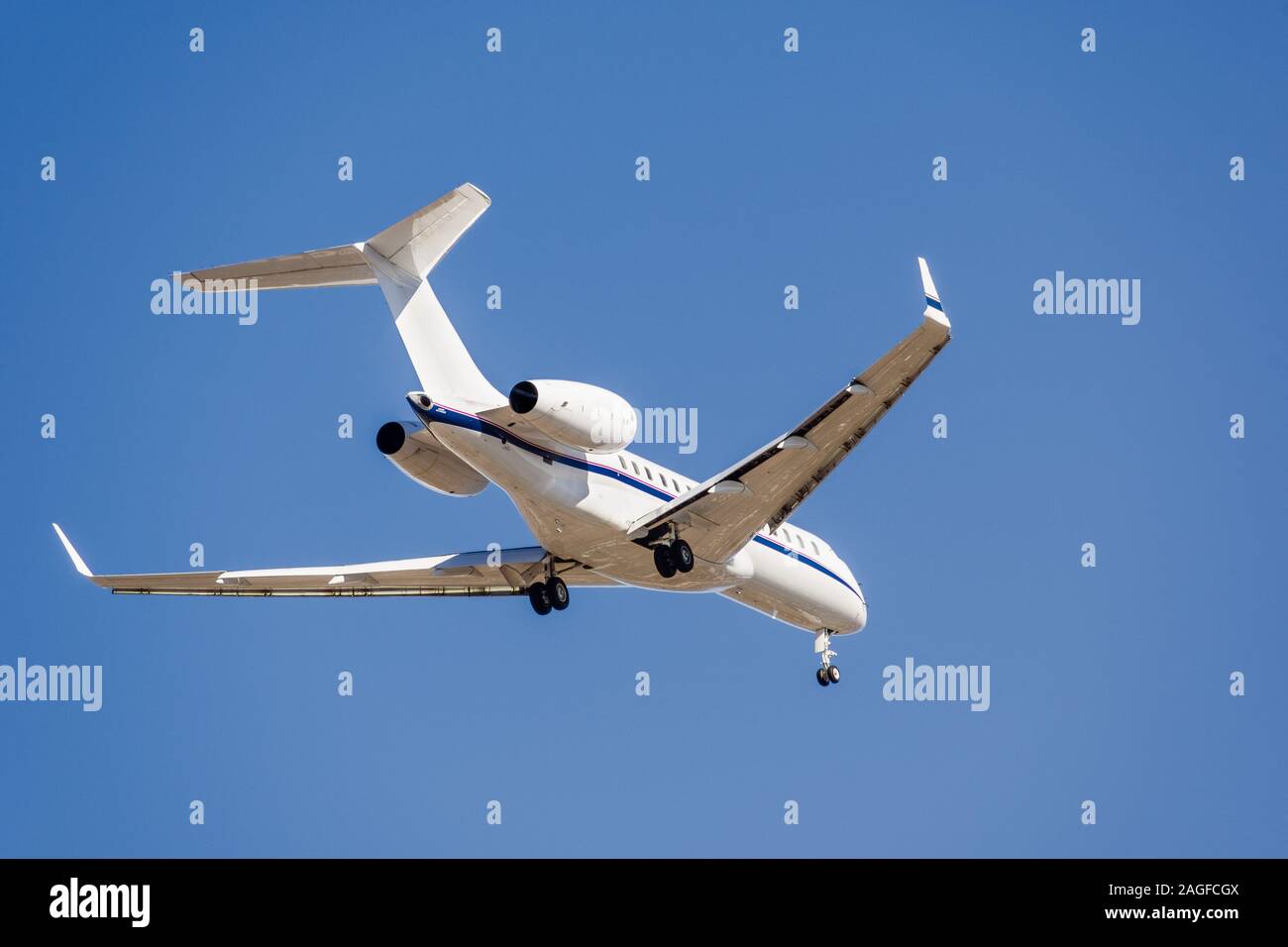 Private airplane preparing to land at an airport in California Stock Photo