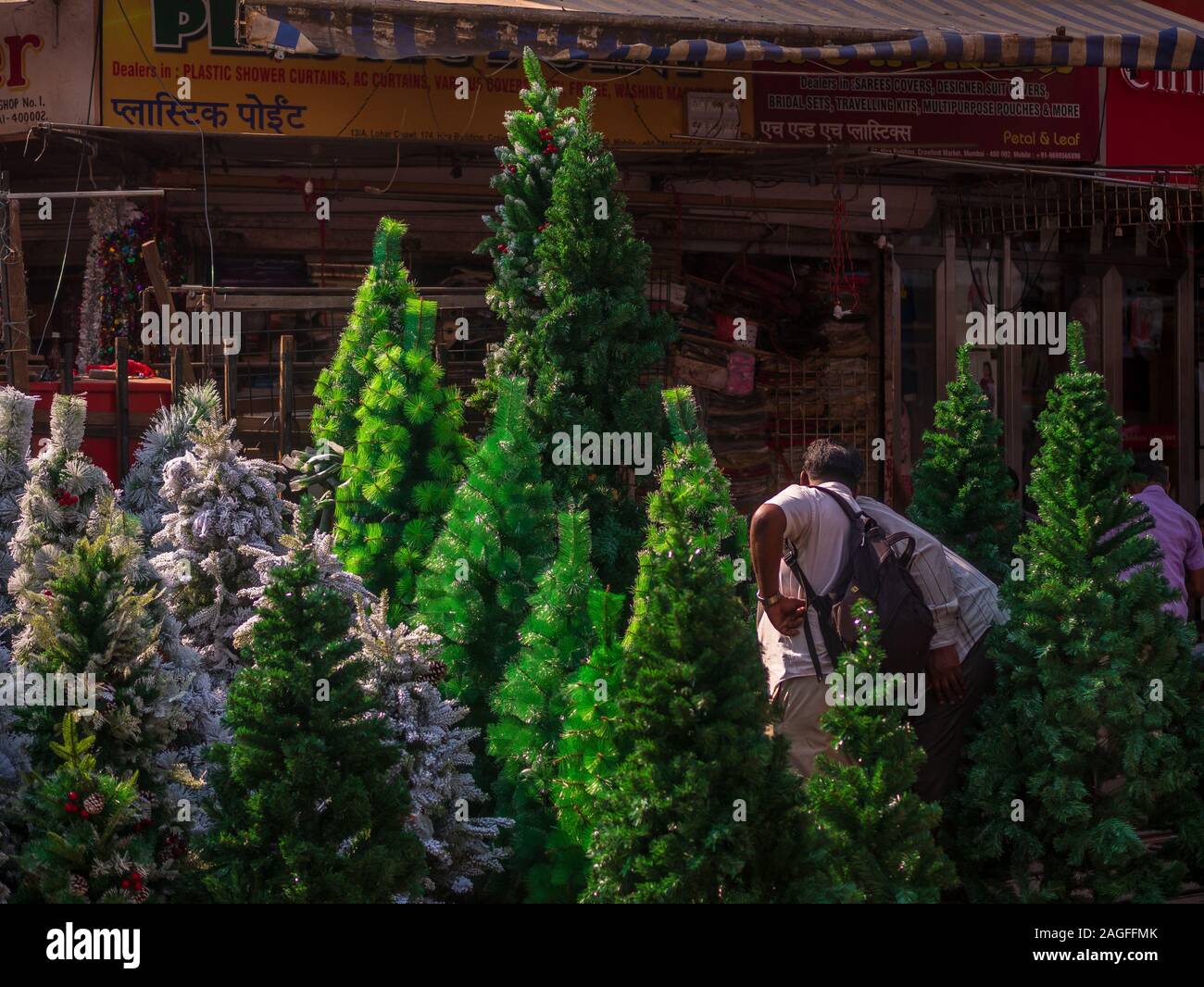 Christmas tree ornaments decorative material celebrating Christmas Festival  kept for sell in shop at Borivali Mumbai Stock Photo - Alamy