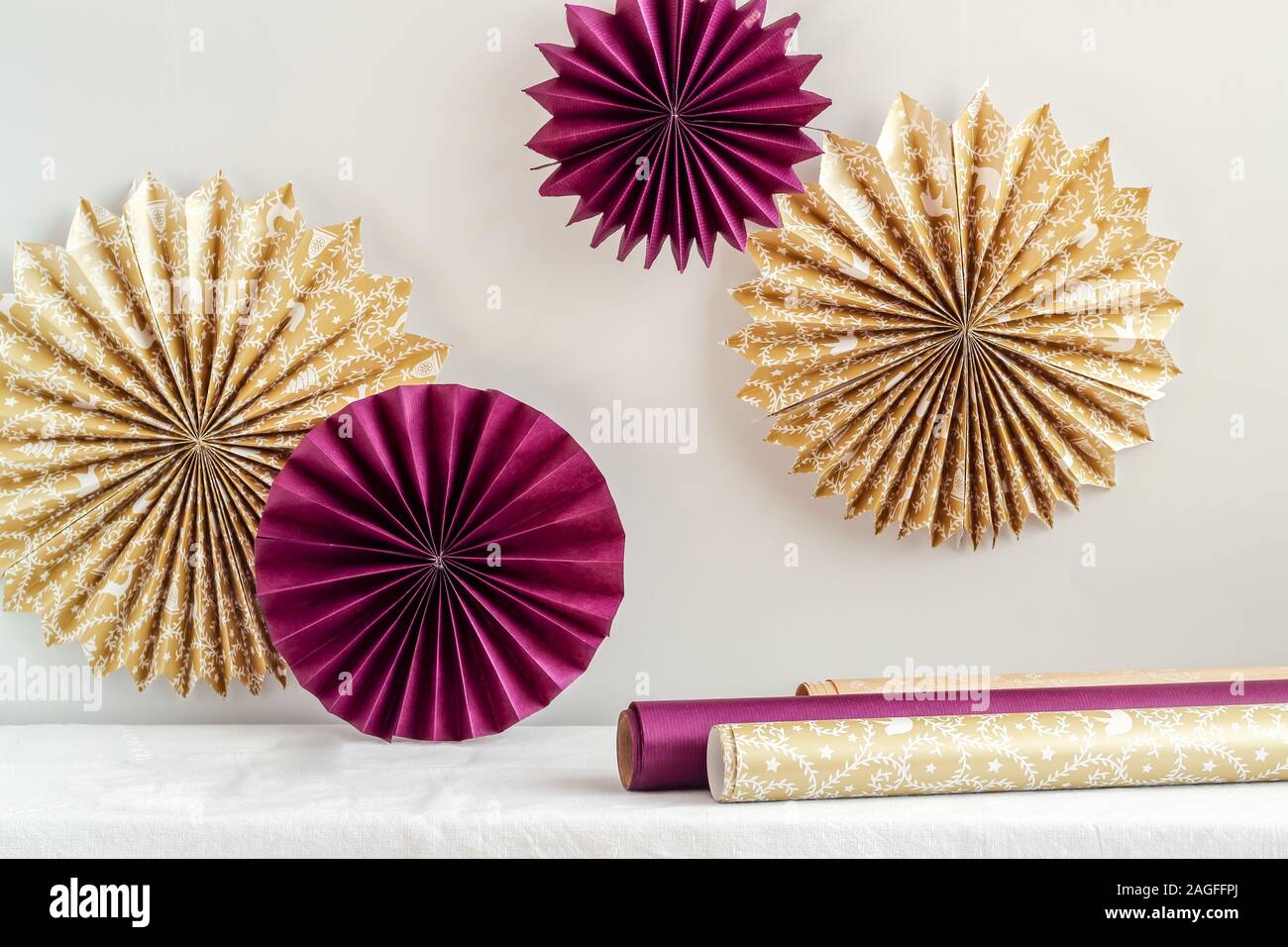 World wide dynamic State Simple DIY paper stars/snowflakes hanging on a wall. Party decorations  Stock Photo - Alamy