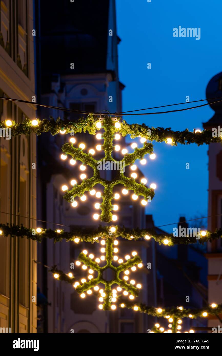 Untere Bachgasse in Regensburg with christmas light chain decoration during night Stock Photo