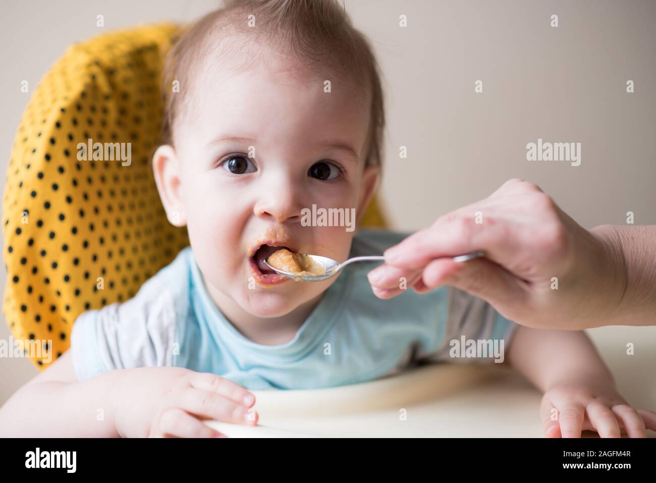 baby eating from spoon