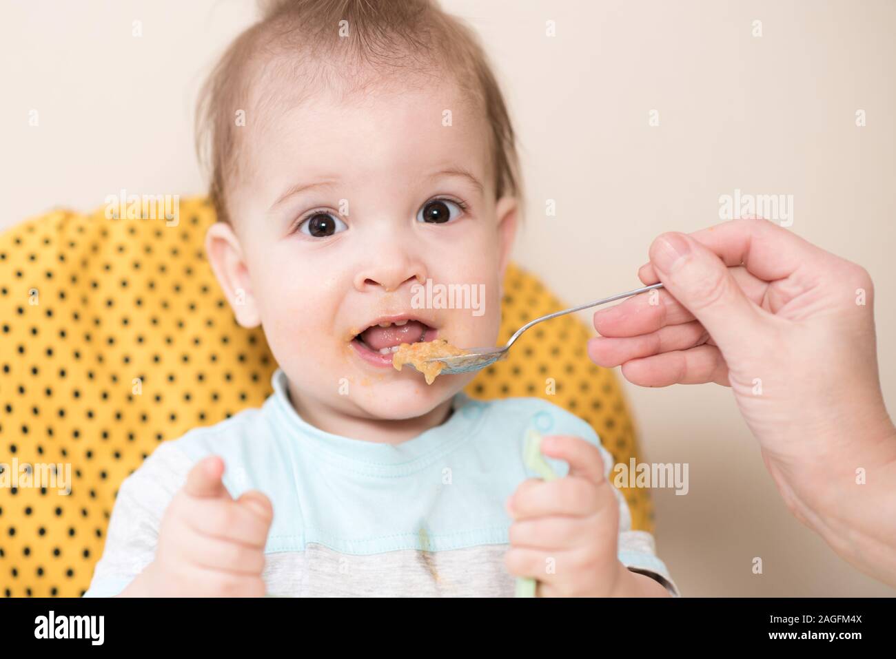 baby eating from spoon