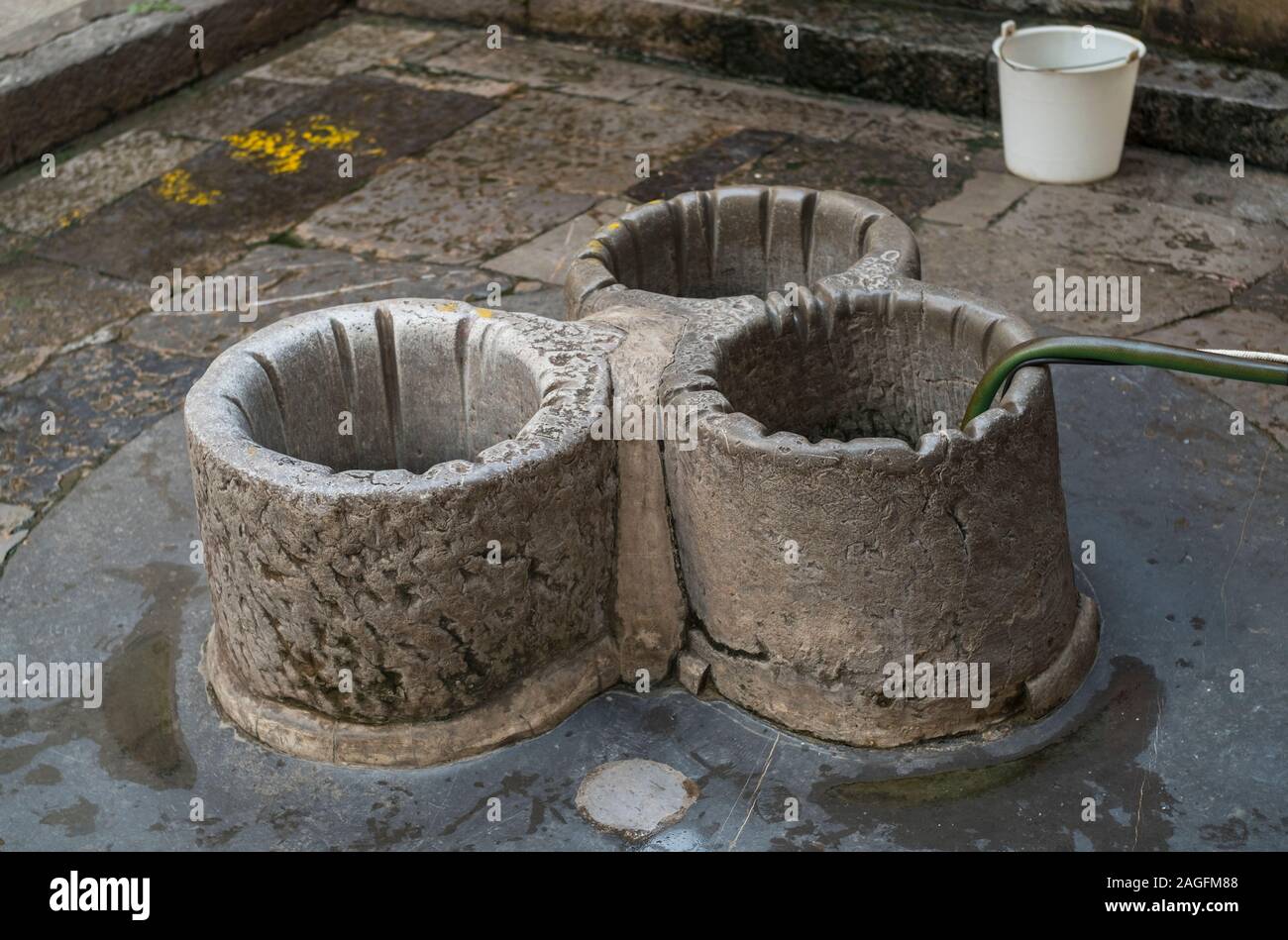 A historical three-mouthed well in Jianshui, Honghe, Yunnan, China. Stock Photo