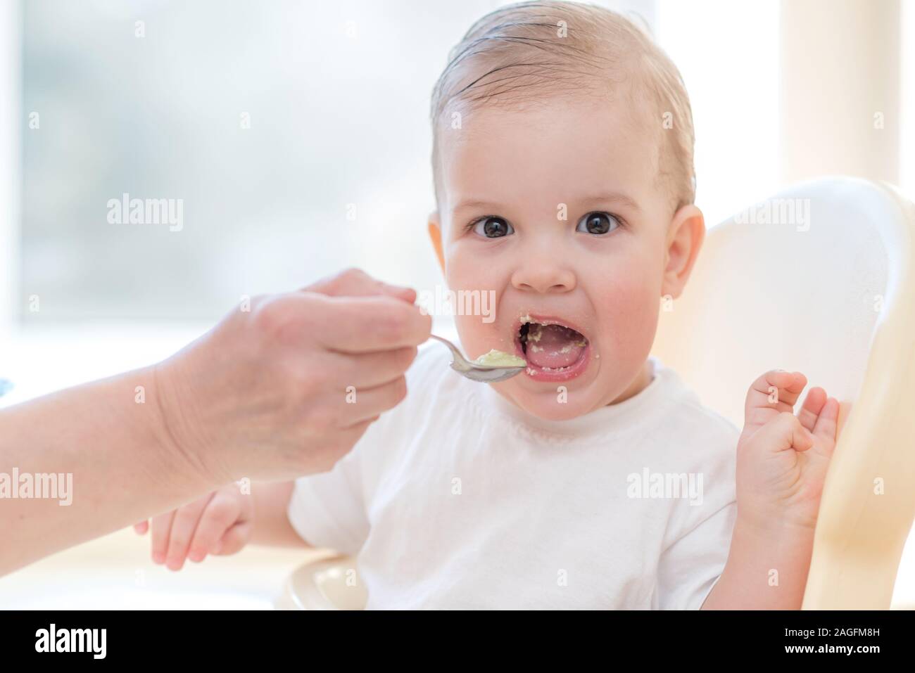 baby eating porridge