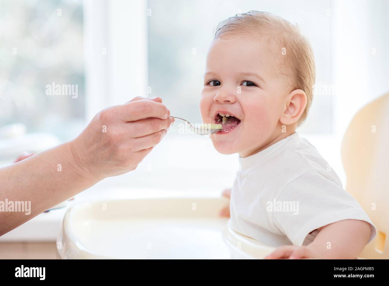 baby eating from spoon
