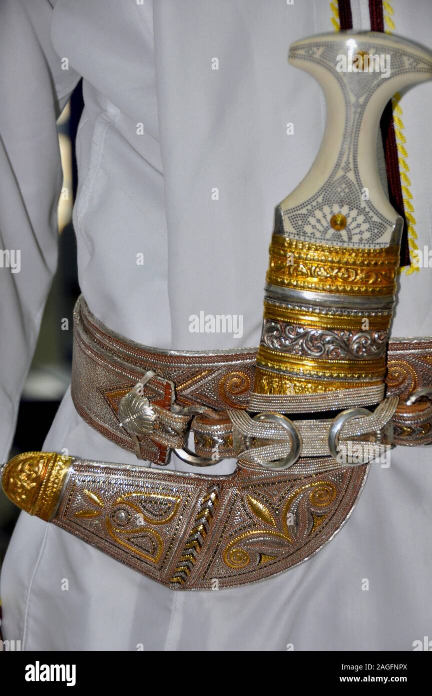 An Omani gent wears a ceremonial Khanjar dagger Stock Photo