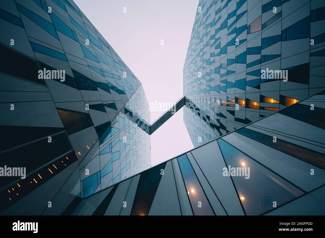 Low angle shot of a modern business building touching the sky Stock ...