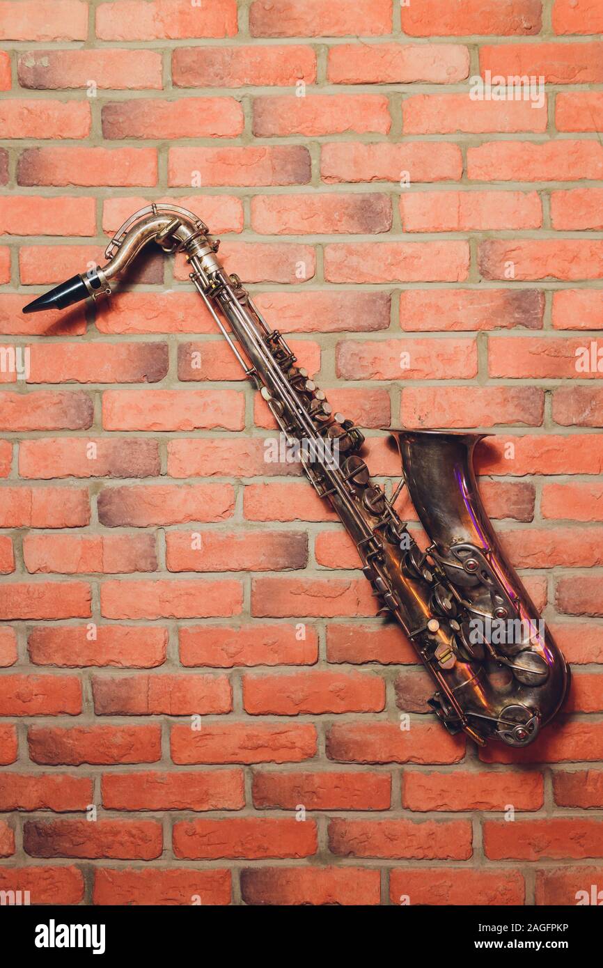 Saxophone classical music instrument Saxophonist with alto sax closeup