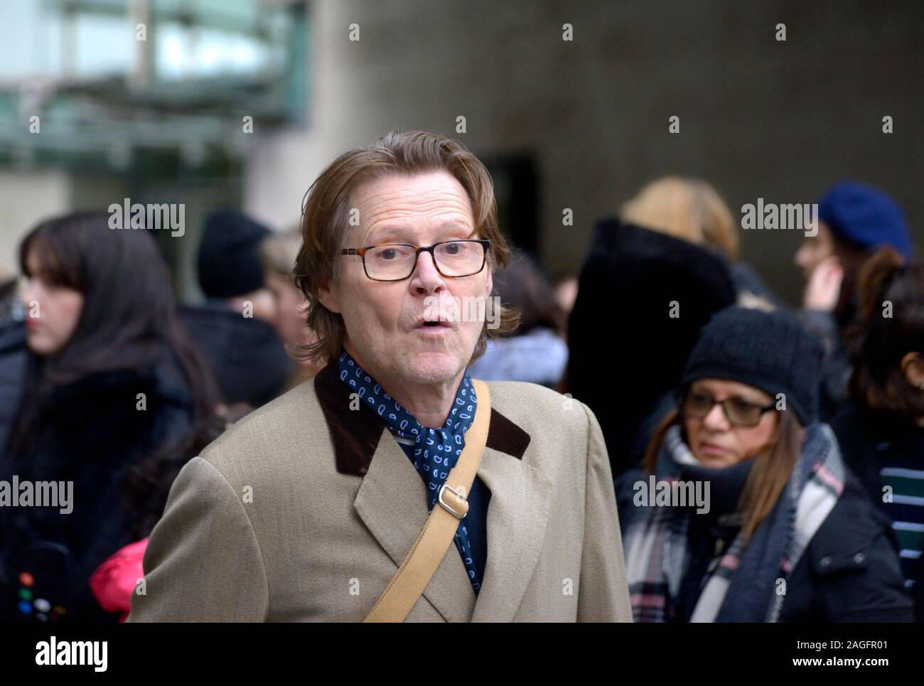 Robert Elms - writer and broadcaster - leaving BBC Broadcastin House, December 2019 Stock Photo