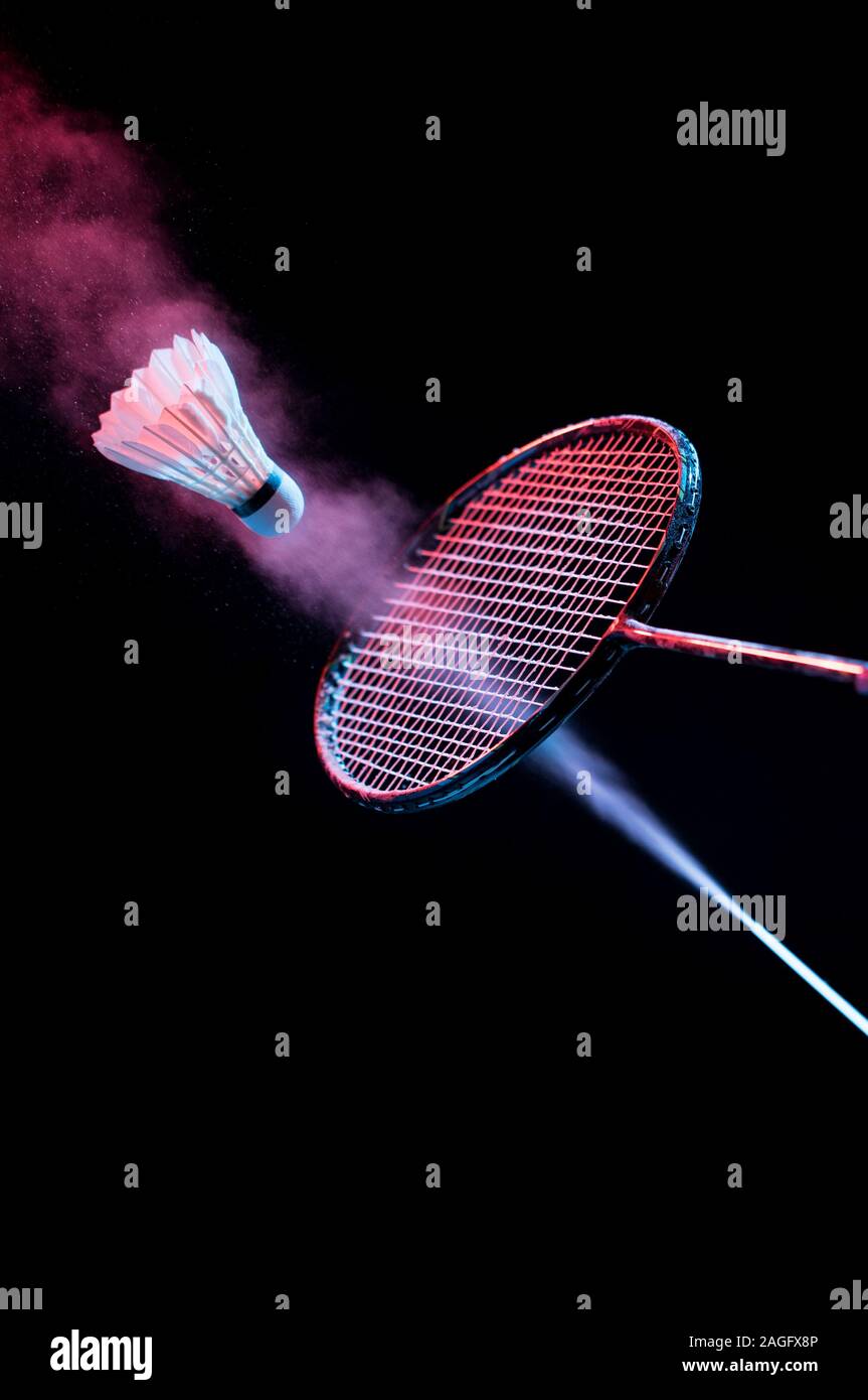 Badminton racket and shuttlecock in motion , shuttlecock sport Stock