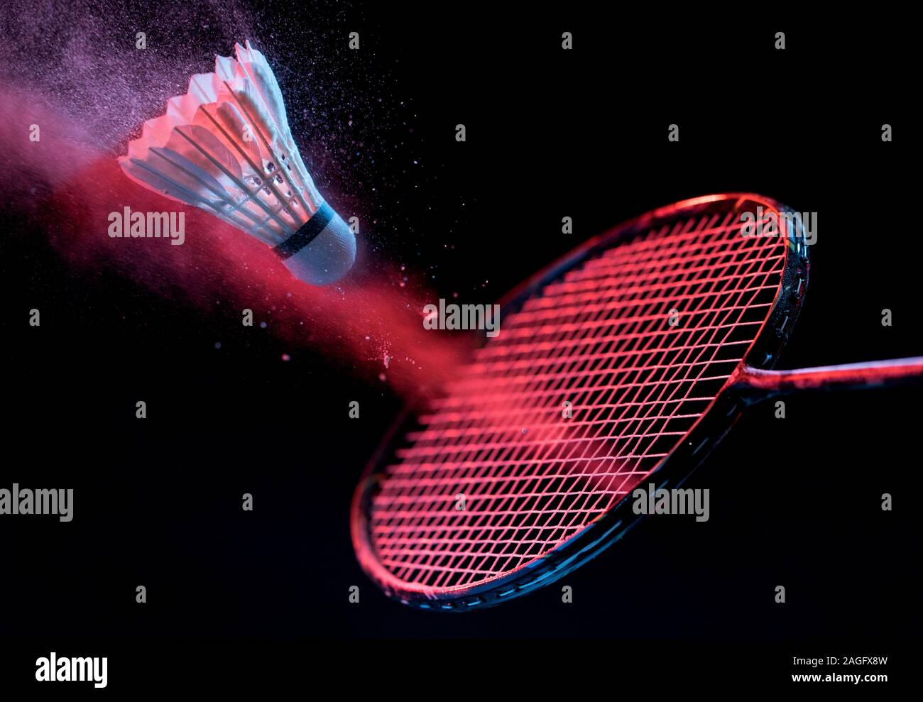Badminton racket and shuttlecock in motion , shuttlecock sport Stock