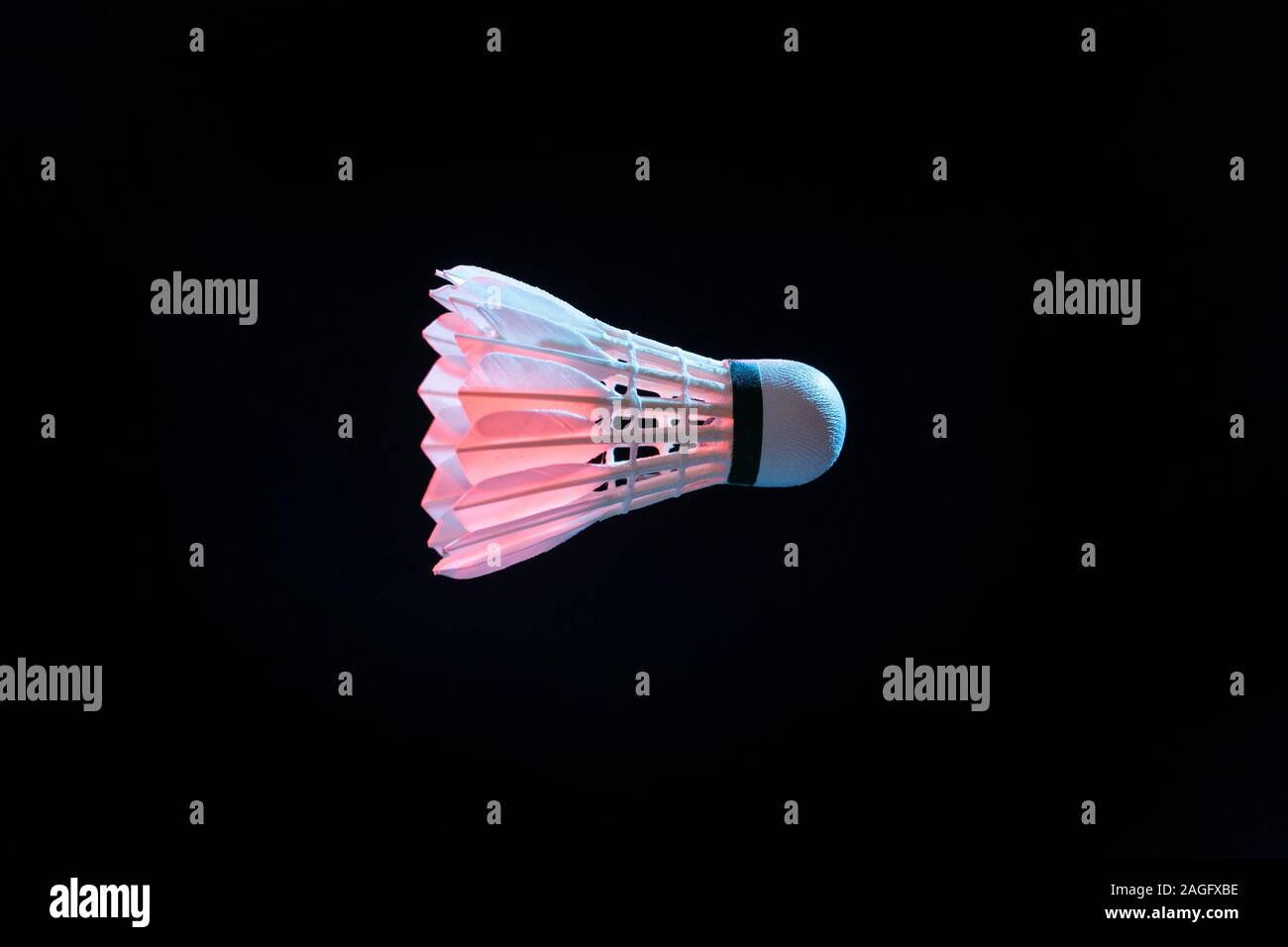 Badminton racket and shuttlecock in motion , shuttlecock sport Stock