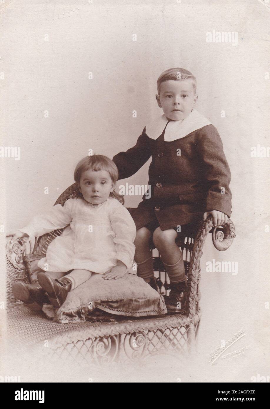 Vintage black and white postcard photo of Victorian children. Stock Photo