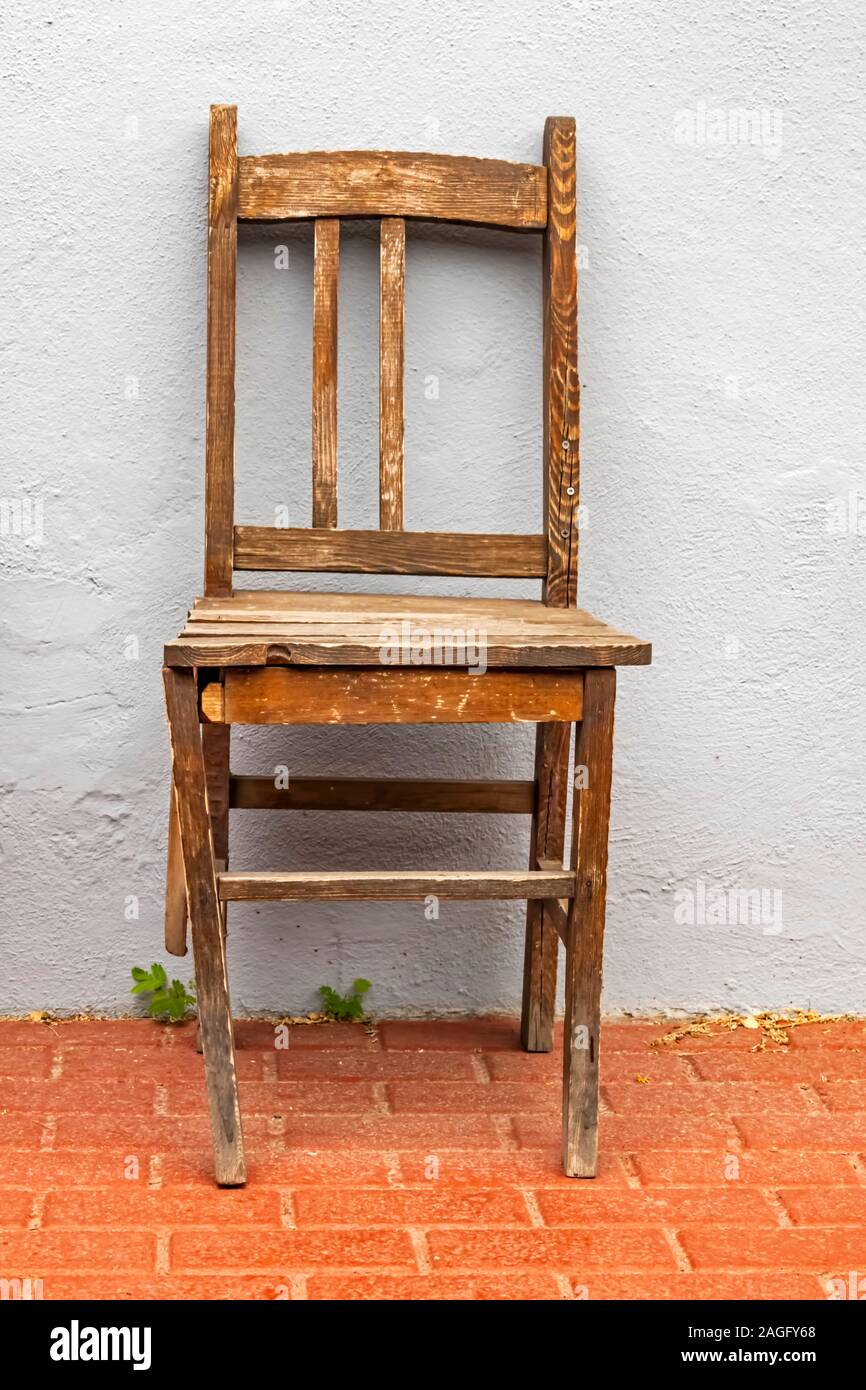 old and broken chair on floor Stock Photo Alamy