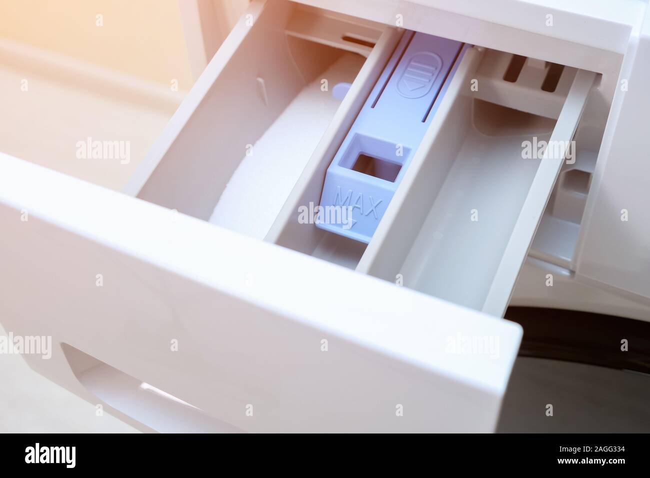 Open Empty Detergent Drawer Of Modern Washing Machine Standing On