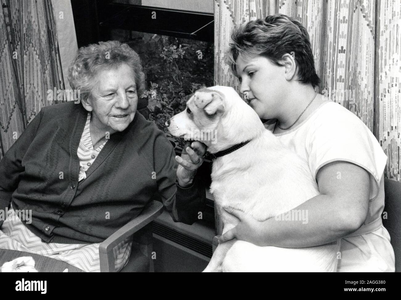 Carer & elderly woman, Nottingham UK 1987 Stock Photo