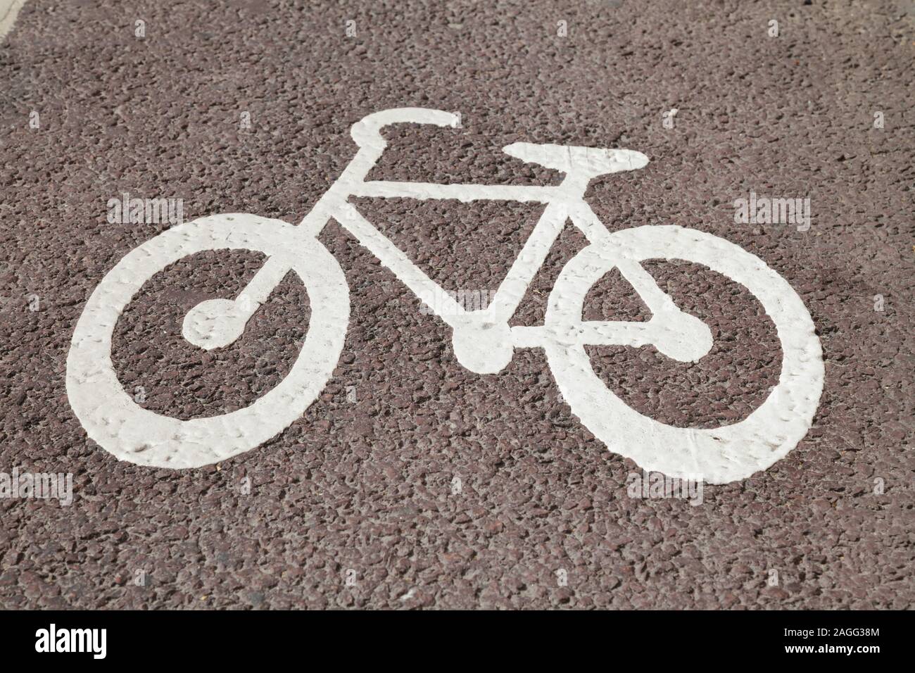 Bike lane sign on a cycle track Stock Photo