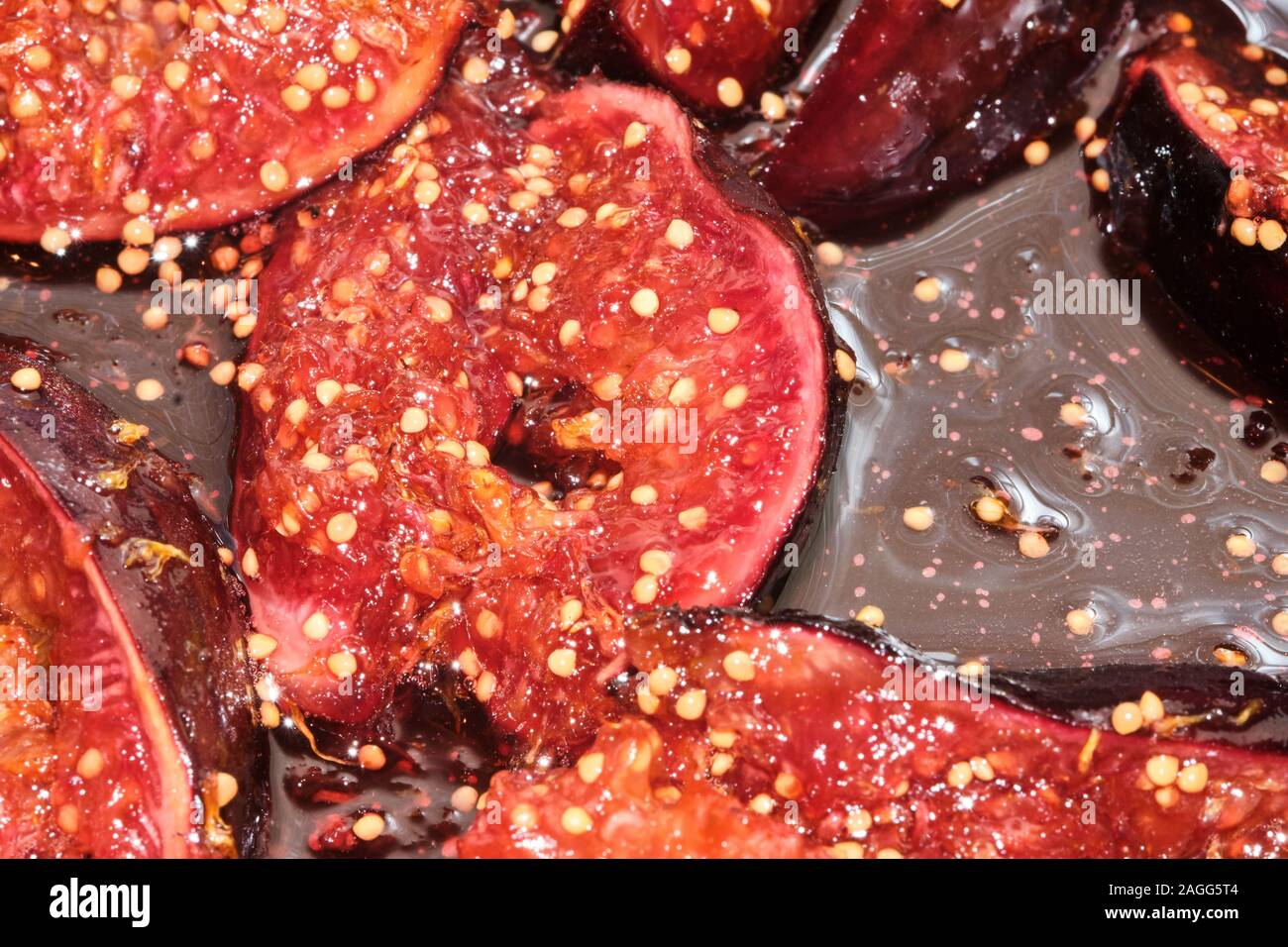 Close-up picture of Caramellized black figs, italian tasty ingredient for every kind of dessert Stock Photo