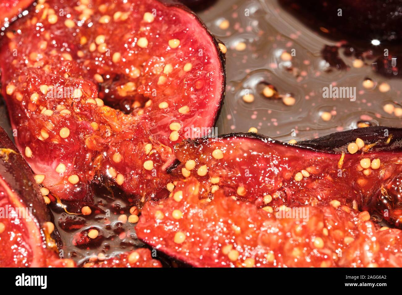 Close-up picture of Caramellized black figs, italian tasty ingredient for every kind of dessert Stock Photo