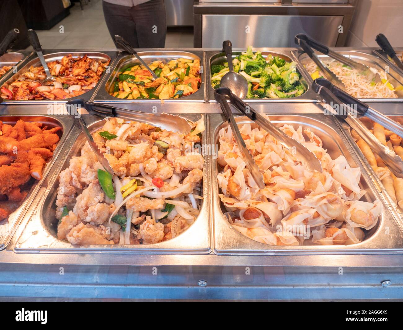 Chinese food on display in a chinese restaurant window, served in a buffet  Stock Photo - Alamy