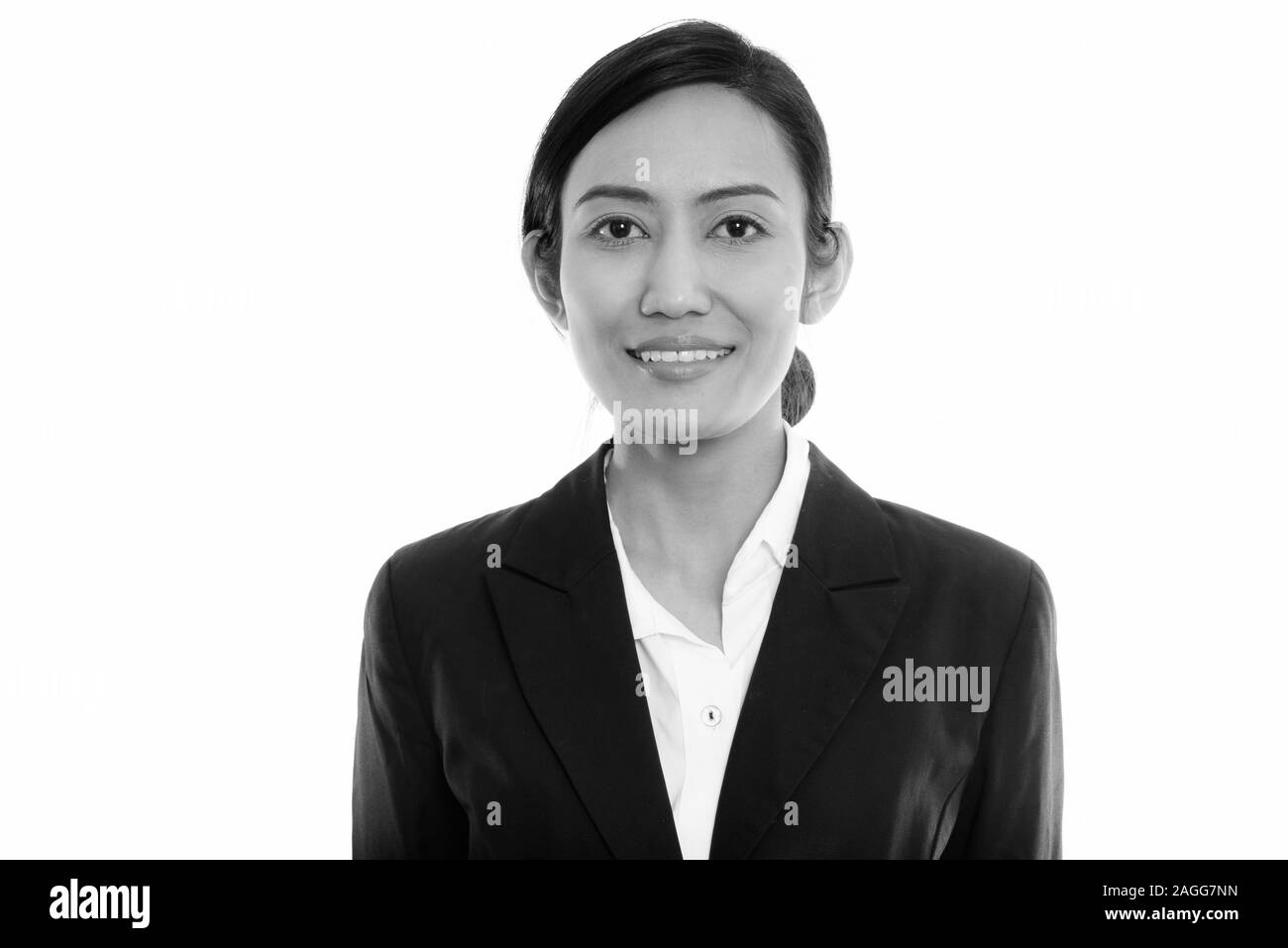 Studio Shot Of Young Happy Asian Businesswoman Smiling With Hair Tied Stock Photo Alamy