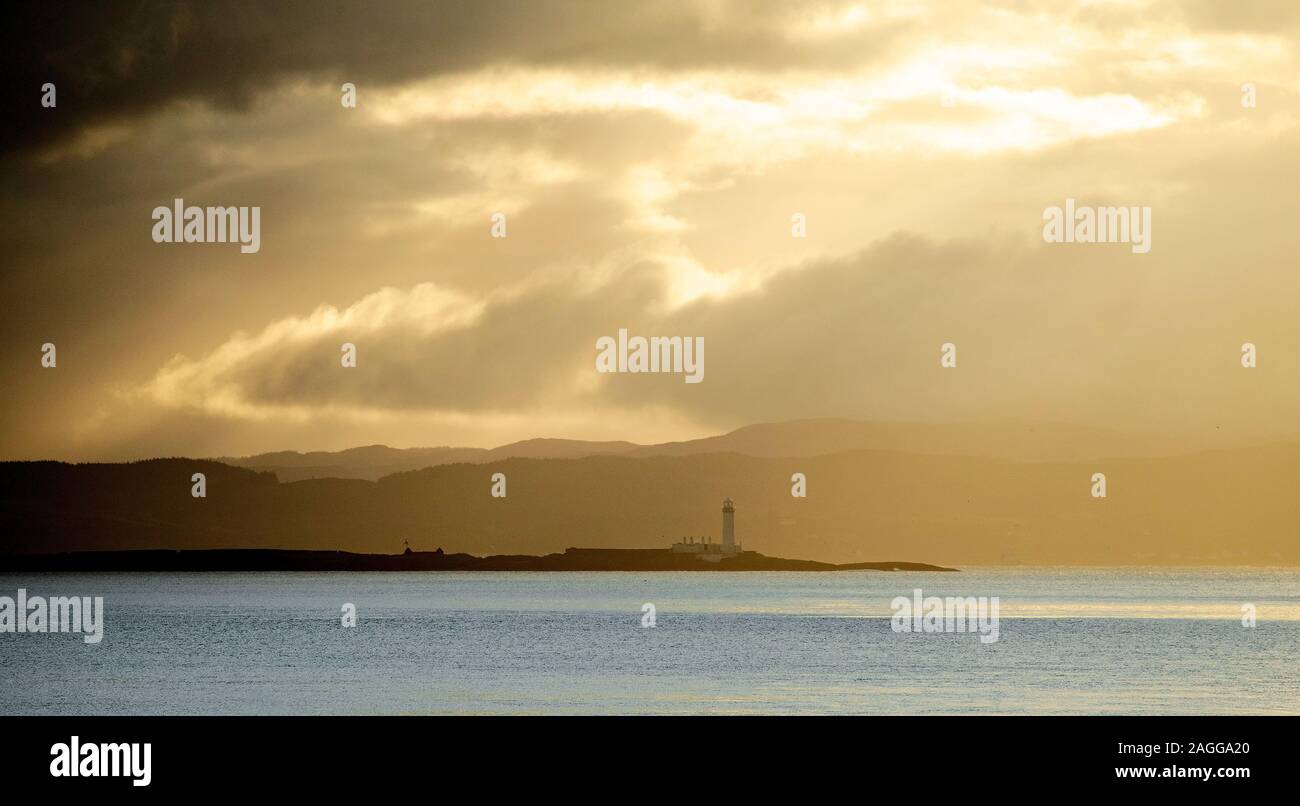 Ilean Musdile lighthouse in the early morning light, from Craignure, Isle of Mull, Scotland. Stock Photo
