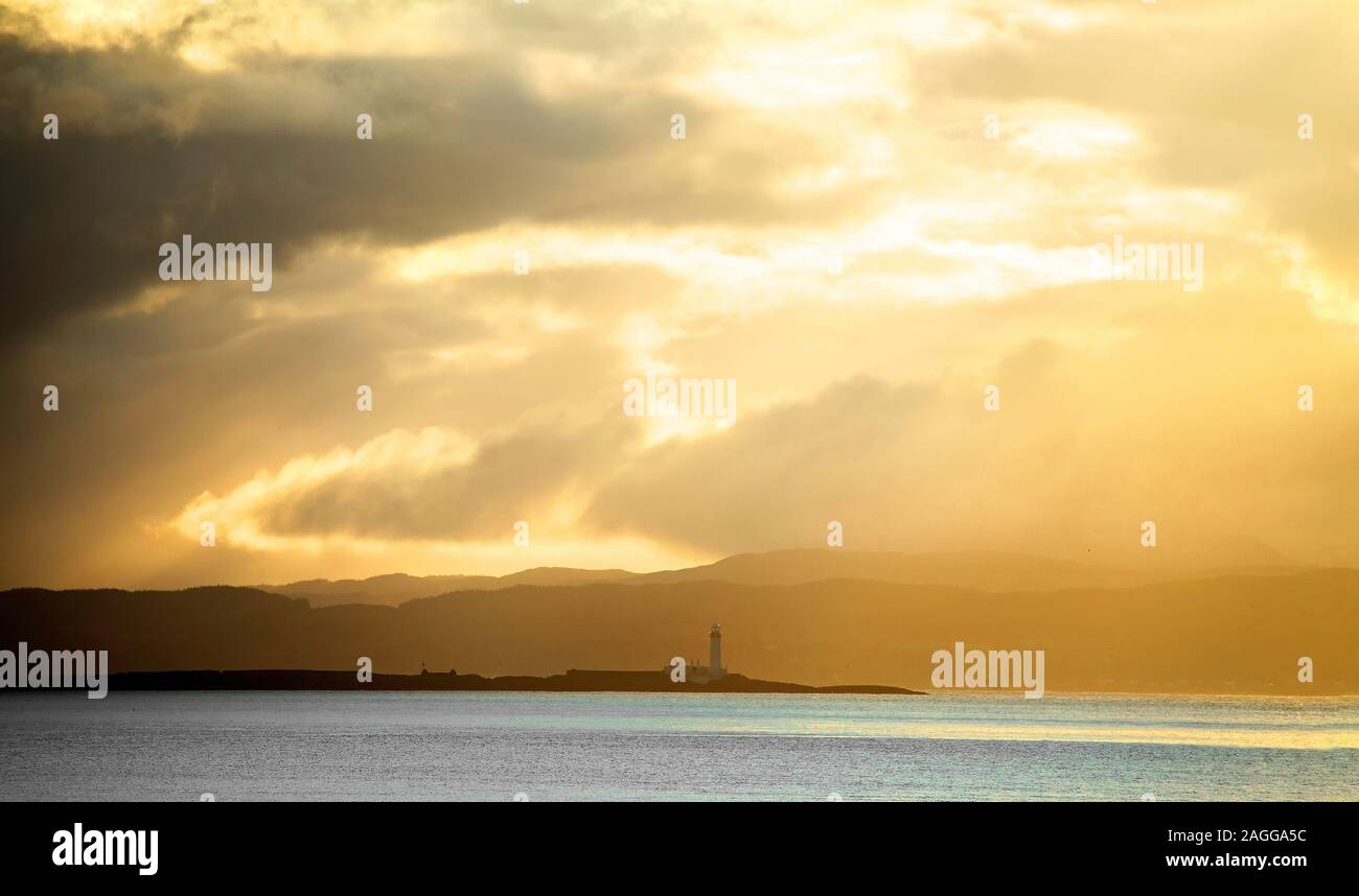 Ilean Musdile lighthouse in the early morning light, from Craignure, Isle of Mull, Scotland. Stock Photo