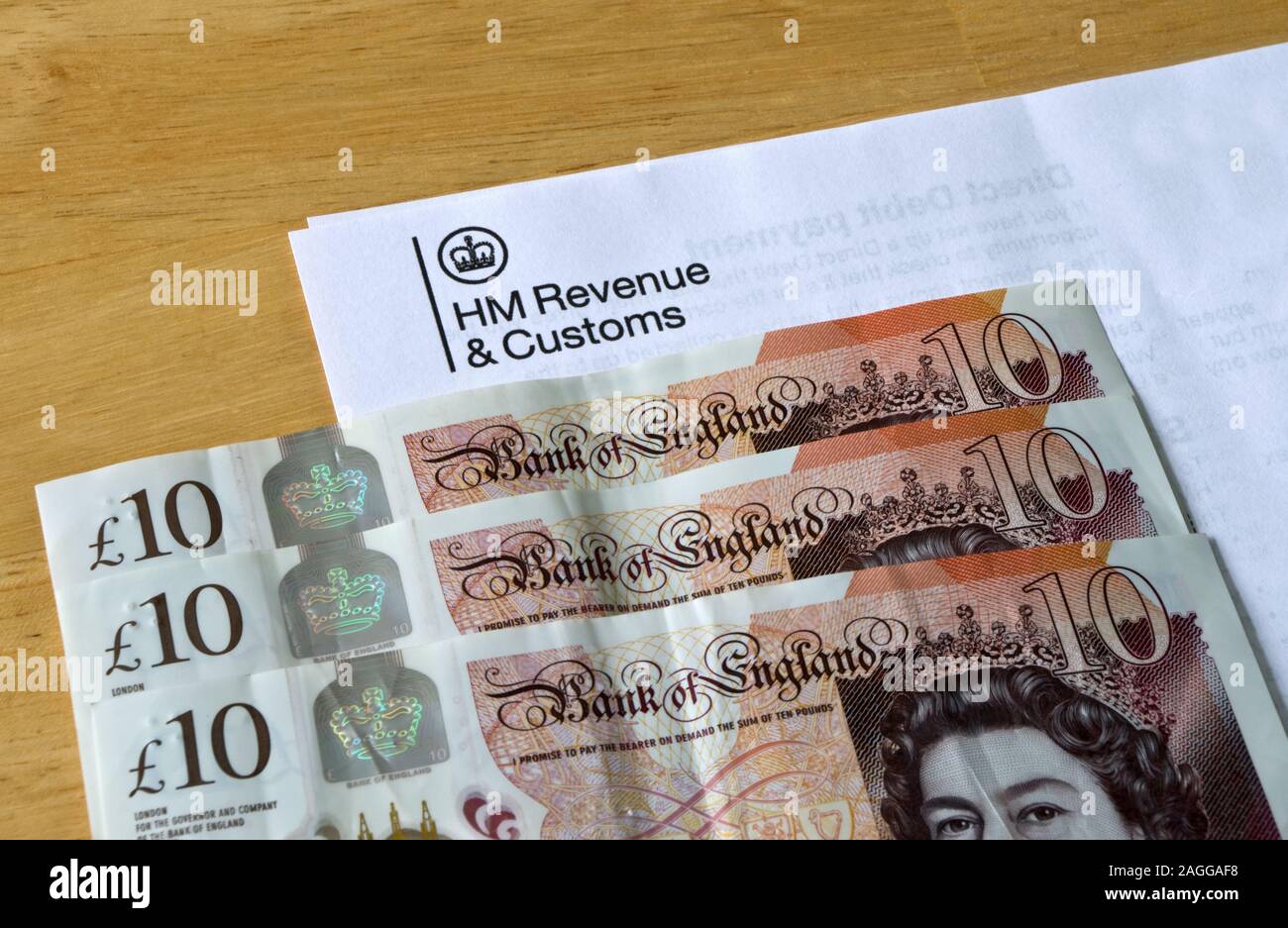 HM Revenue and Customs With Sterling Cash Money, UK Stock Photo