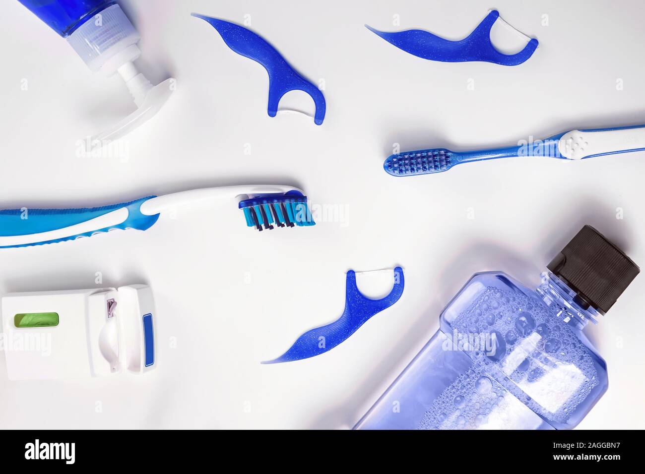 Flat lay with dental care products on white background. Stock Photo