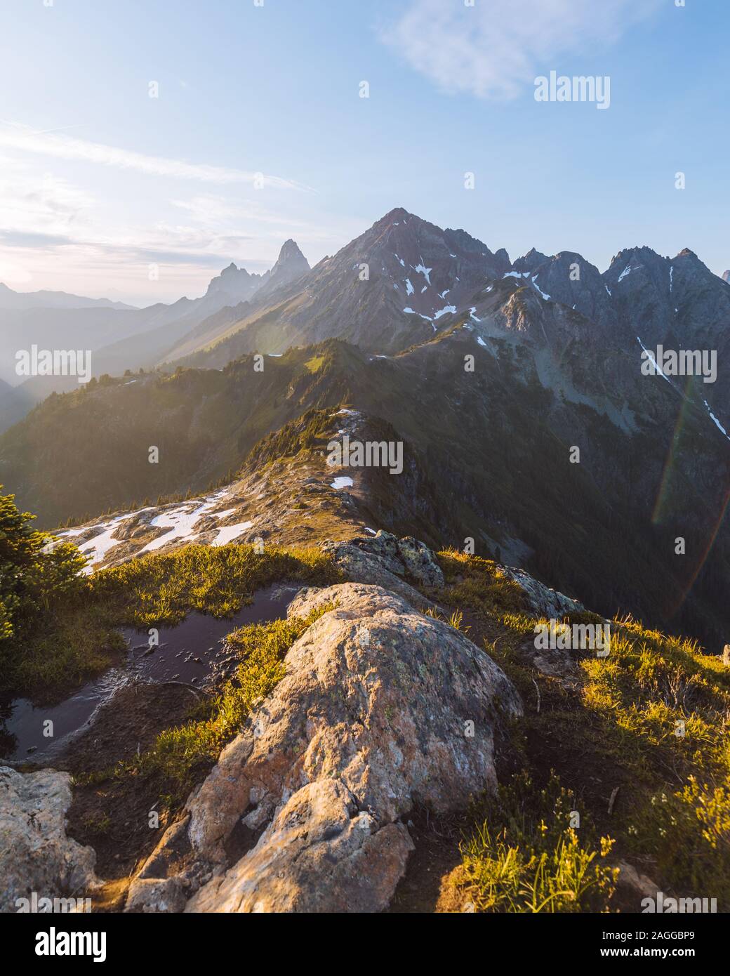 Sun flare over mountain hi-res stock photography and images - Alamy