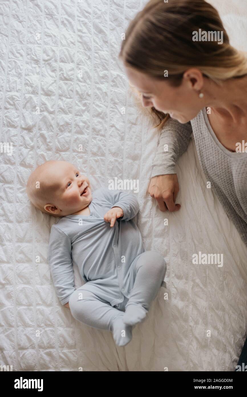 Mother baby sleeping new born hi-res stock photography and images - Alamy