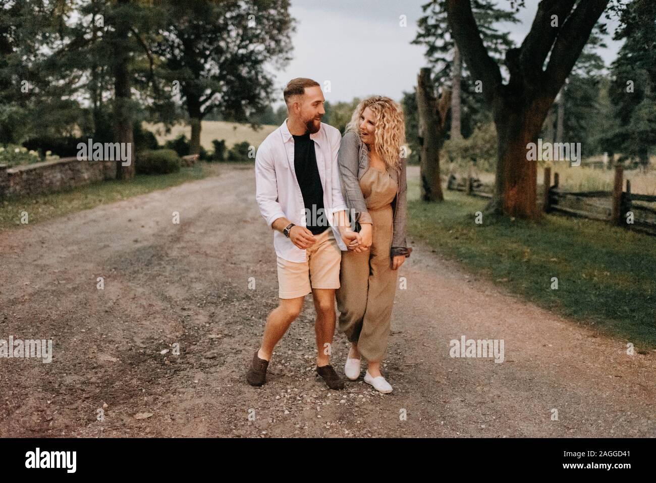 Two men walking talking wearing hi-res stock photography and images - Alamy